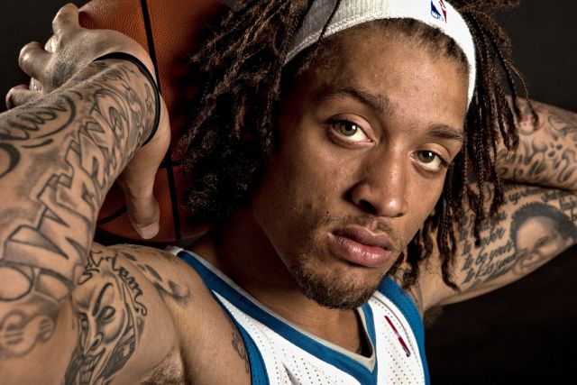 Face / Lettering Tattoo On Arm – Michael Beasley