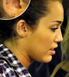 Miley Cyrus Reacts To Idiot Perez Hilton Sports New Ear Tattoo