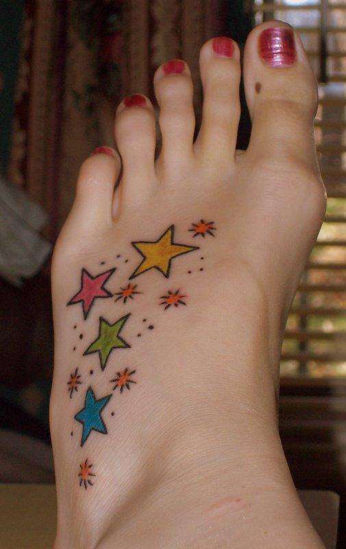 Colorful Tattoos Of Small Stars On Foot