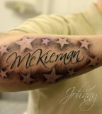 Name With Shaded Stars Tattoo On Forearm