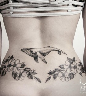neat-flower-and-whale-tattoo