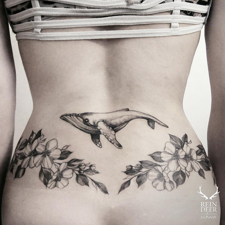 neat-flower-and-whale-tattoo