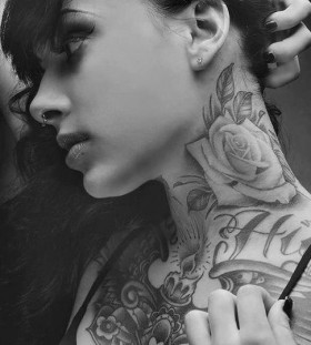 neck rose flower tattoo