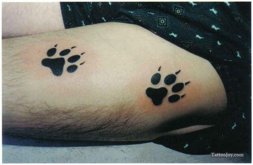 Simple Paw Prints Tattoo Foot Meaning