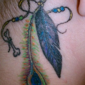 Small Peacock Feather Tattoo Designs for Women