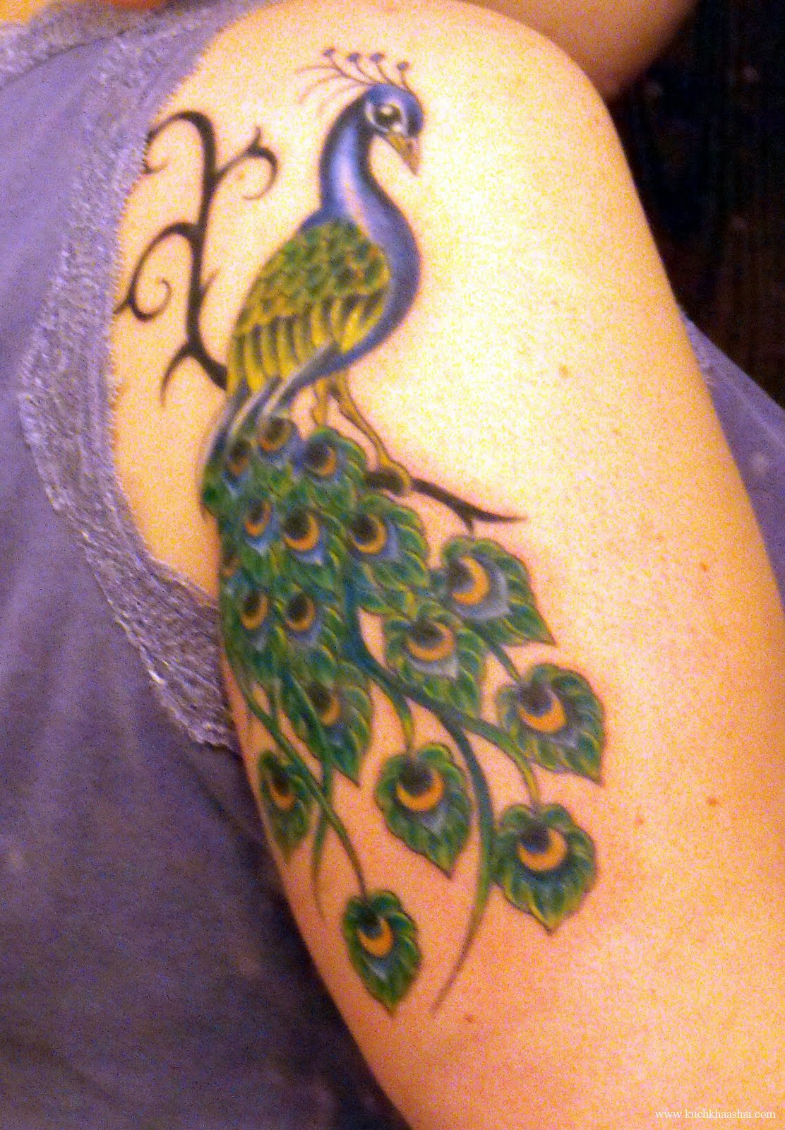 Peacock Tattoo Design on Arm for Women - | TattooMagz › Tattoo Designs