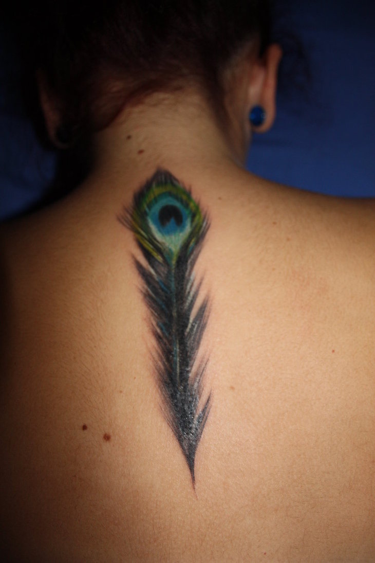 Girl with Peacock Feather Tattoo on Back