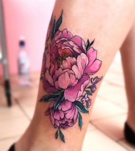 pink watercolor flower tattoo