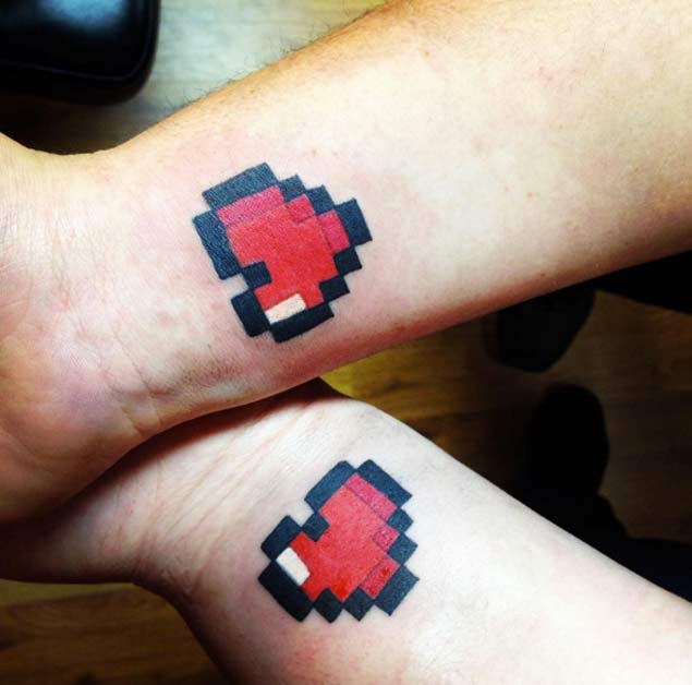 pixeled hearts couple tattoo