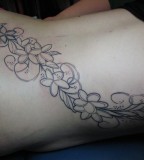 Plumeria Flower Throughout Body Tattoo