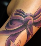 Beautiful Ribbon Purple Tattoo Design For Girls