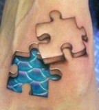 Gorgeous 3D Puzzle Piece Tattoo Design