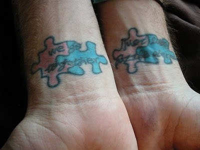 A Couple of Meaningful Puzzle Pieces Tattoos on Both Wrists