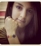 Three Little Different Color Puzzle Pieces Outer Wrist Tattoo Idea for Girls
