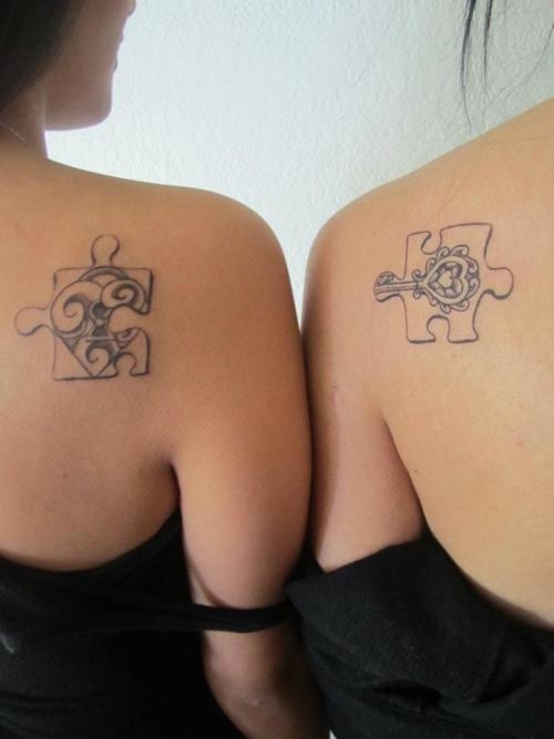 Couple Puzzle Piece Tattoos Meaning on Two Girls Back Shoulder