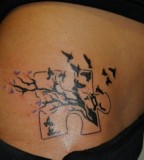 Awesome Silhouette Birds on Puzzle Piece Hips Tattoo Design for Girls