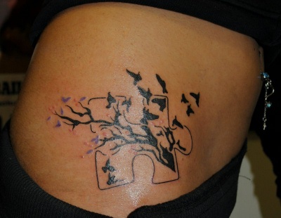 Awesome Silhouette Birds on Puzzle Piece Hips Tattoo Design for Girls