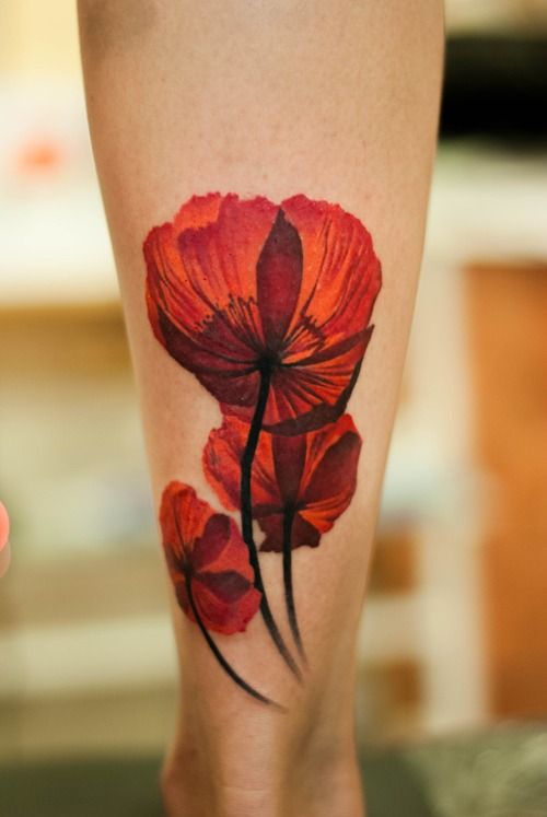 red orange poppy flower tattoo