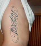 Loyalty And Respect Ambigram Tattoo On The Ribs