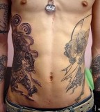 Unique Rib Tattoos Pictures