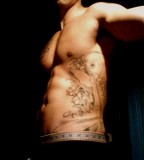 Muscular Men with Rib Tattoo Ideas