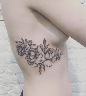 ribcage flower tattoo