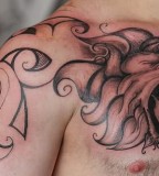 Awesome Lion And Tribal Tattoos Images