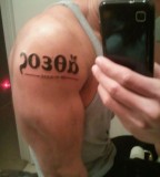 Numeric Upper Arm Body Tattoo