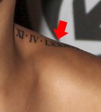 Rihanna's Shoulder Roman Numeral Tattoo