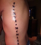 Side Tattoo With Roman Numeral Design