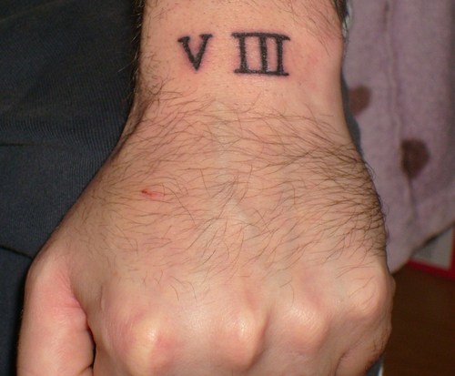 Lucky Number 8 In Roman Numerals Tattoo