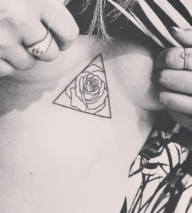 rose-triangle-sternum-tattoo