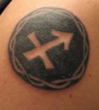 Cool Sagittarius Symbol with Circle Tattoo Design