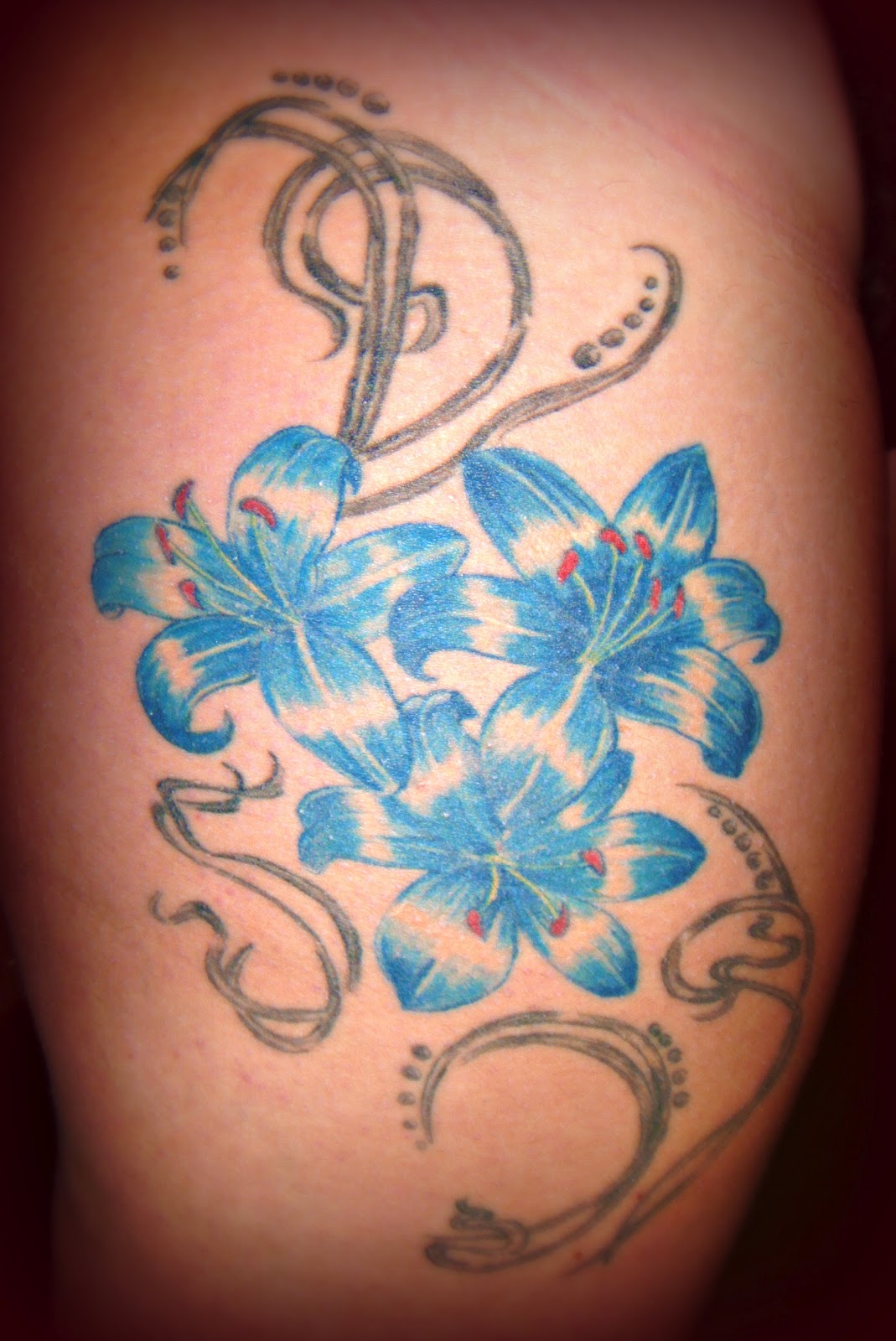 September Birth Blue Flower Tattoo For Girl.