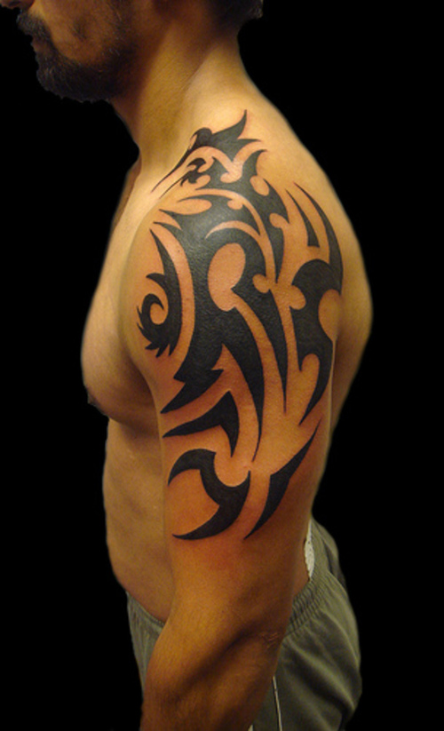 Dark Tribal Shoulder Tattoo Designs for Men