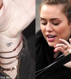 Miley Cyrus Wrist Tattoos & Meanings