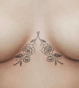 simple underbood flower tattoo