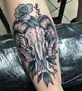 skull and flowers tattoof for women