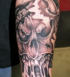 Amazing Artful Dark Side Skulls Tattoo