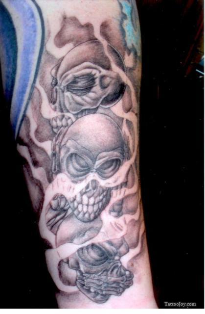 “Hear See Speak No Evil” Smoky Skulls Tattoo Design