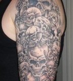 Beautiful Sleeve Oskulls Skull Tattoo Design for Men