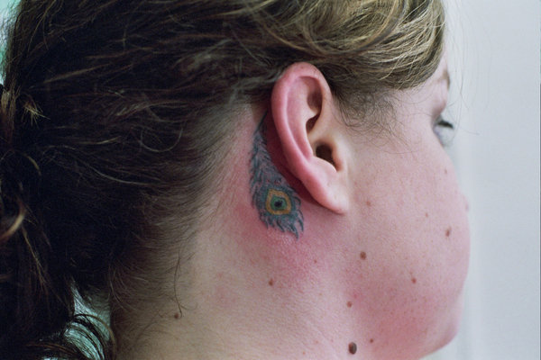 Hidden Feather Peacock Tattoo On Back Ear
