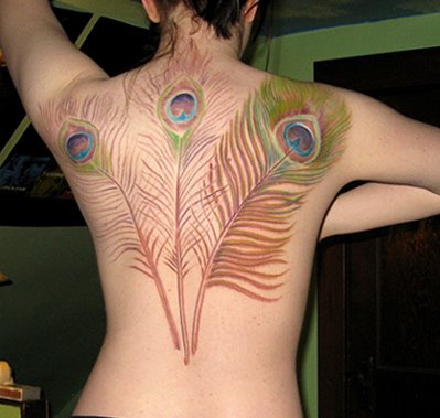 Girl With Peacock Feather Tattoo Design On Back