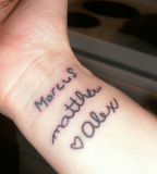 Tattoo with People Name on Wrist