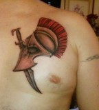 Red Spartan Helmet Tattoos On The Chest