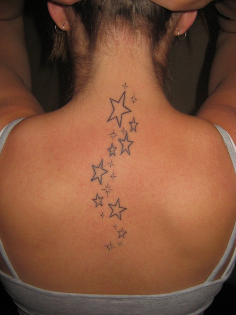 Star Tattoo On Woman Back