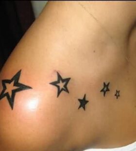star tattoos on women shoulder