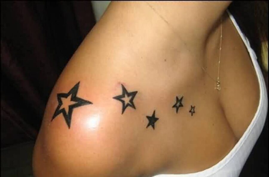 Star Tattoo on women shoulder