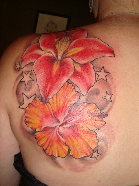 Hibiscus Flower And Stargazer Lily Tattoo On Upper Back