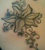 Stargazer Lily Tattoo In Black And Grey